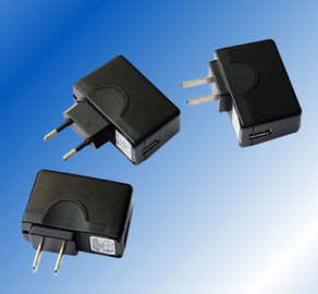 壁の台紙の携帯電話 Usb の充電器